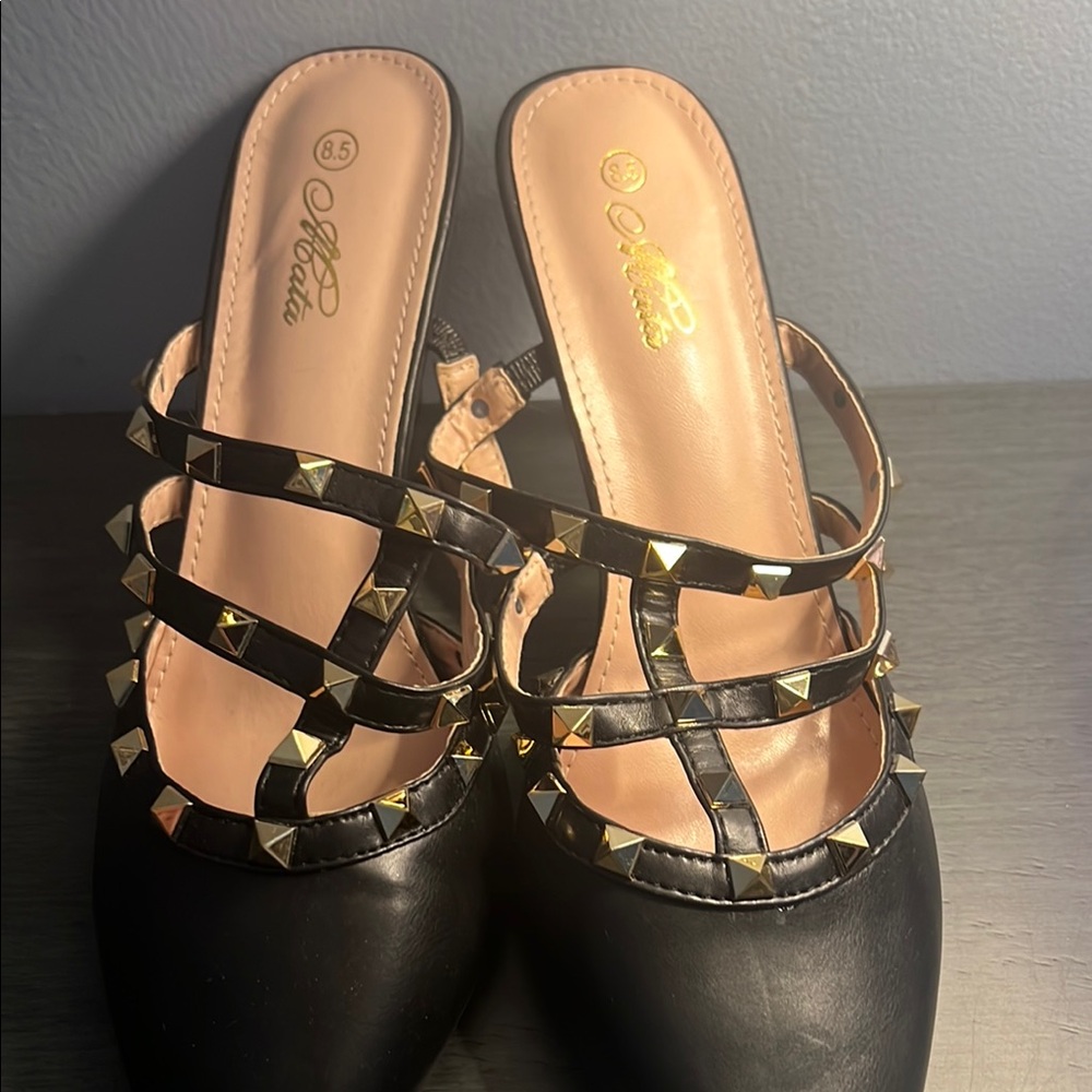 Hot Kiss Black and Gold Mules with Elegant Design